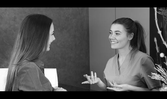 Customer relationship. Discussion front desk black and white